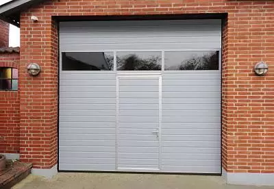 Гаражные секционные ворота с калиткой серии Trend Гаражные секционные ворота с калиткой серии Trend
